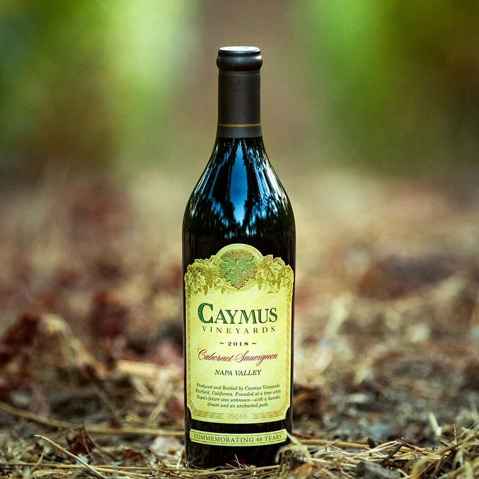 Caymus wine bottle on a natural background