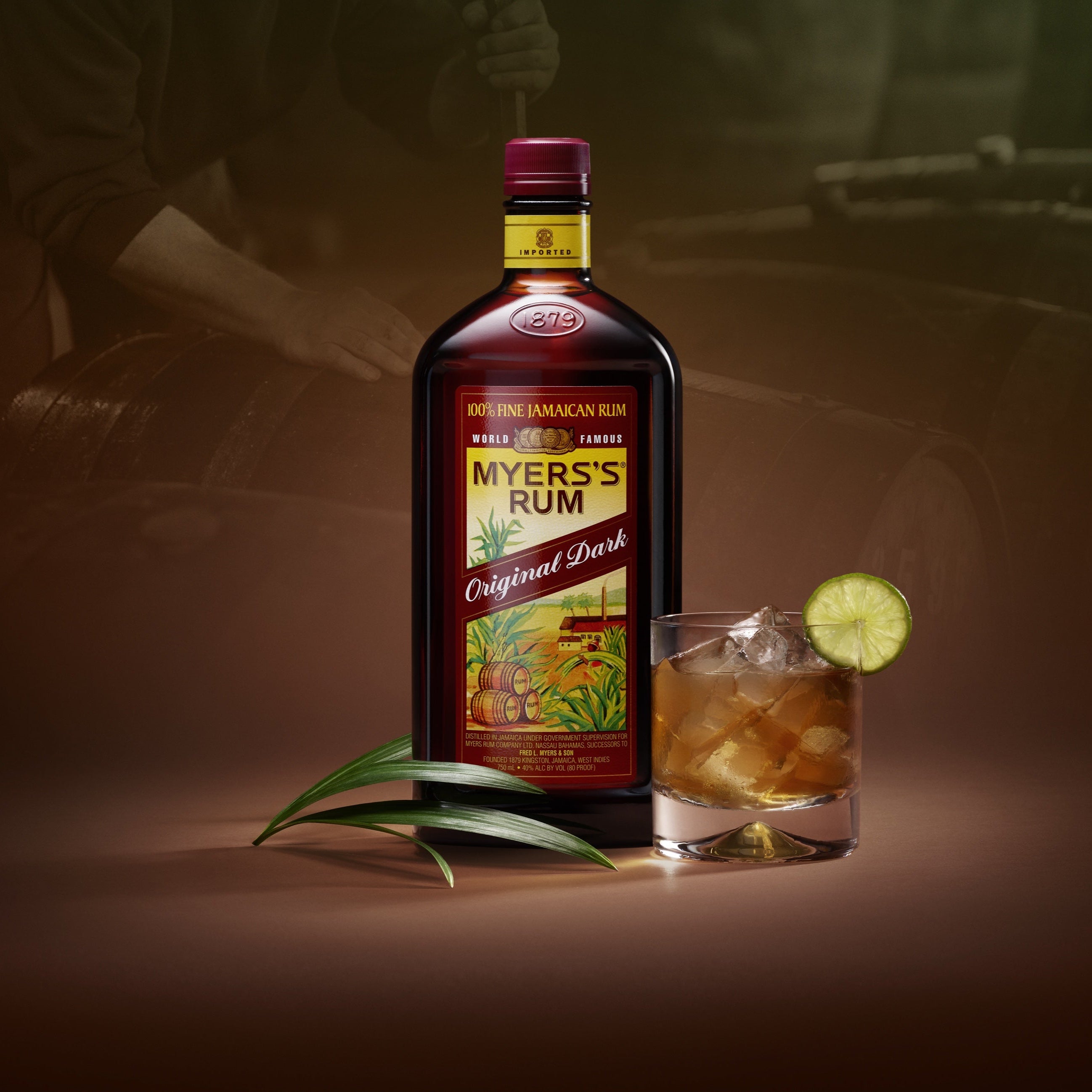 Myers's Rum bottle with a cocktail on a dark background