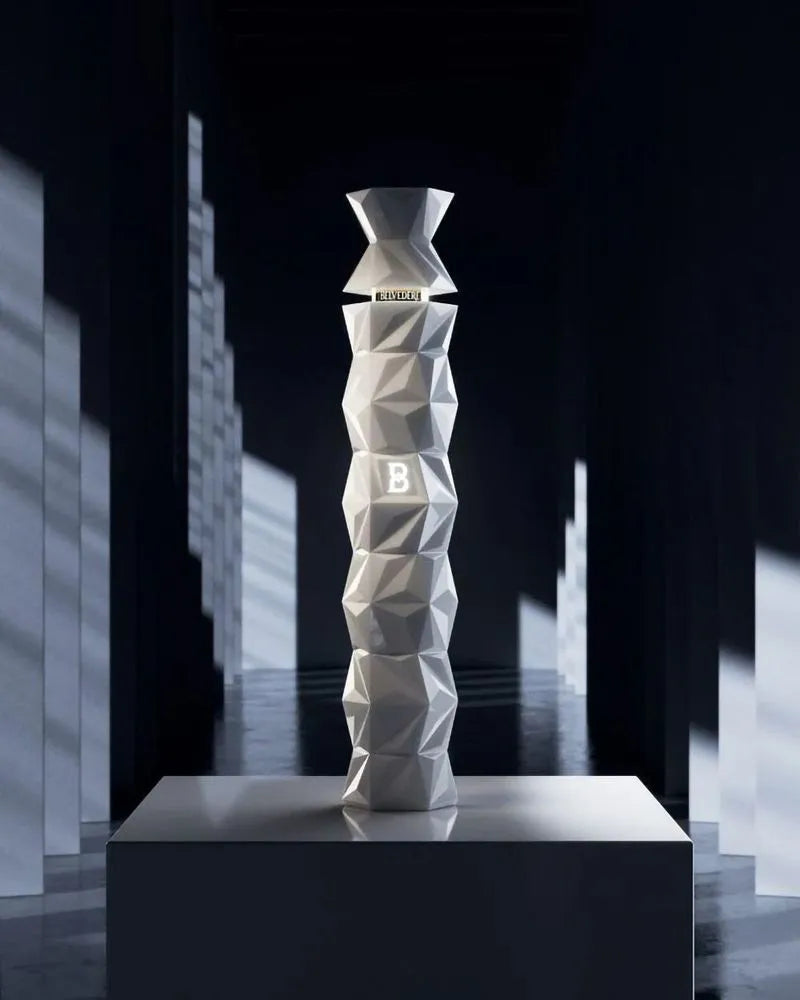 Belvedere 10 Year Vodka in geometric white luxury bottle displayed on pedestal in dark modern setting