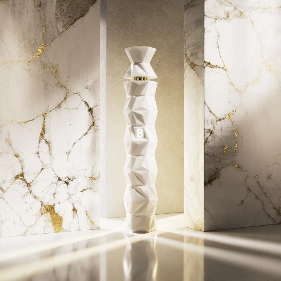 Belvedere 10 Year Vodka in geometric white luxury bottle with marble and gold background