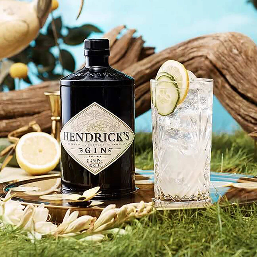 Hendrick’s Gin bottle with cucumber gin and tonic cocktail – premium Scottish gin lifestyle image