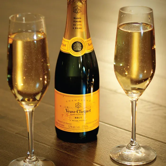 Veuve Clicquot Brut Champagne with two glasses – premium French sparkling wine for celebrations and toasts