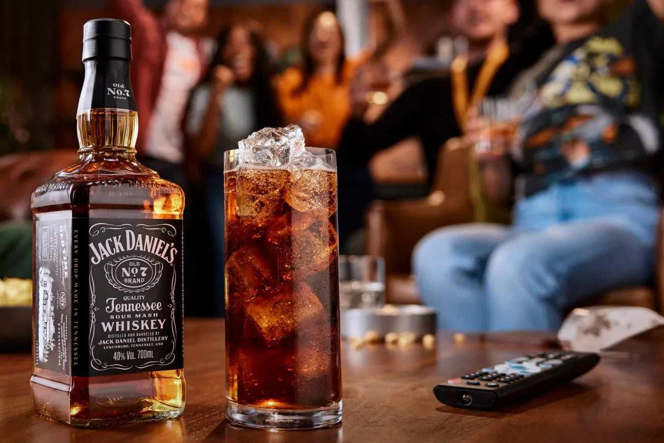 Jack Daniel's next to a whiskey coke cocktail