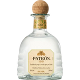 Patrón Silver tequila bottle with cork stopper on a white background