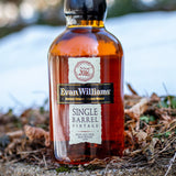 Bottle of Evan Williams Single Barrel Vintage whiskey on a natural background