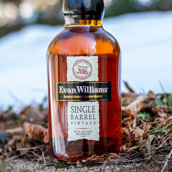 Bottle of Evan Williams Single Barrel Vintage whiskey on a natural background
