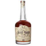 Bottle of Joseph Magnus Straight Bourbon Whiskey on a white background