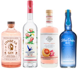 A collection of four bottles of alcohol from the Tropical Escape Bartesian Pack, featuring a gin, vodka, tequila, and rum, each with tropical fruit and floral themes on the labels.