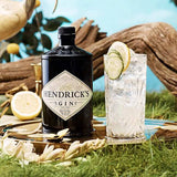 Hendrick’s Gin bottle with cucumber gin and tonic cocktail – premium Scottish gin lifestyle image
