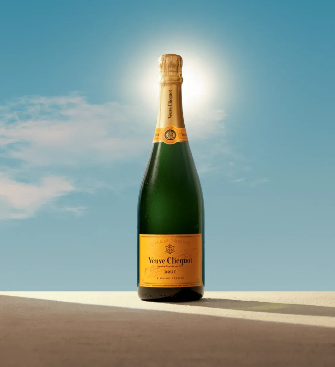 Veuve Clicquot Brut Champagne bottle under the sun – iconic French sparkling wine with yellow label